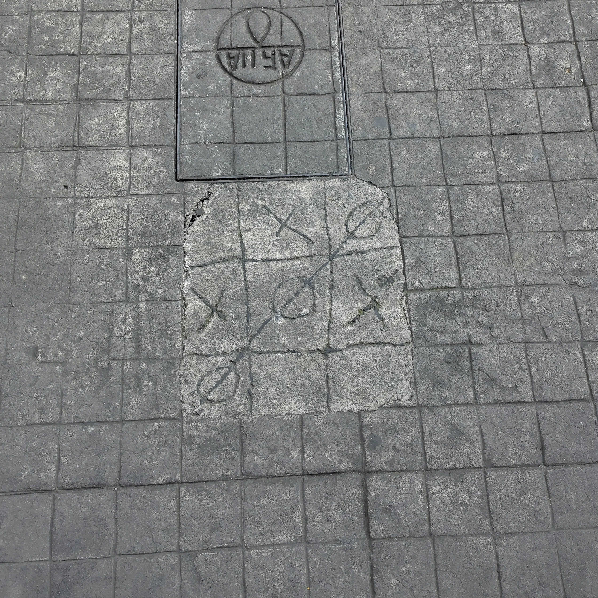 A piece of art on a sidewalk in Orizaba