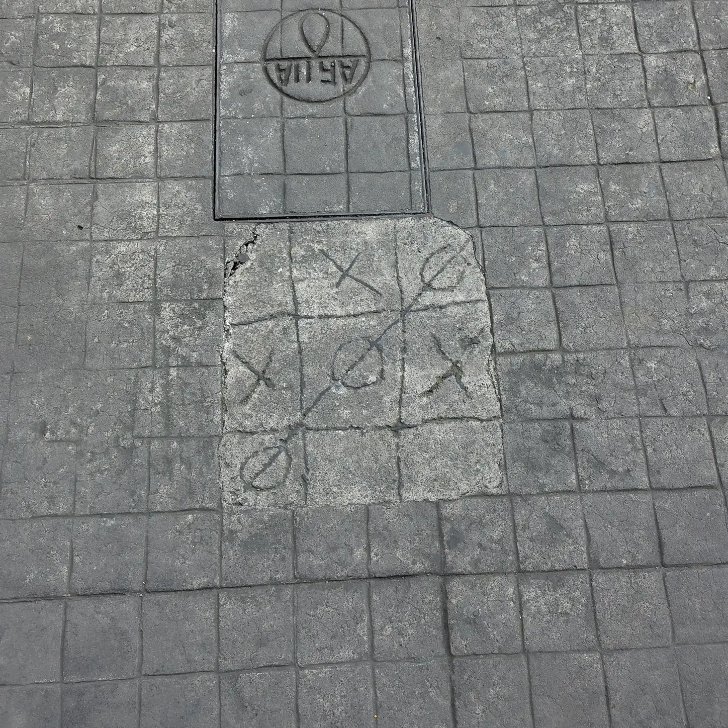 A piece of art on a sidewalk in Orizaba